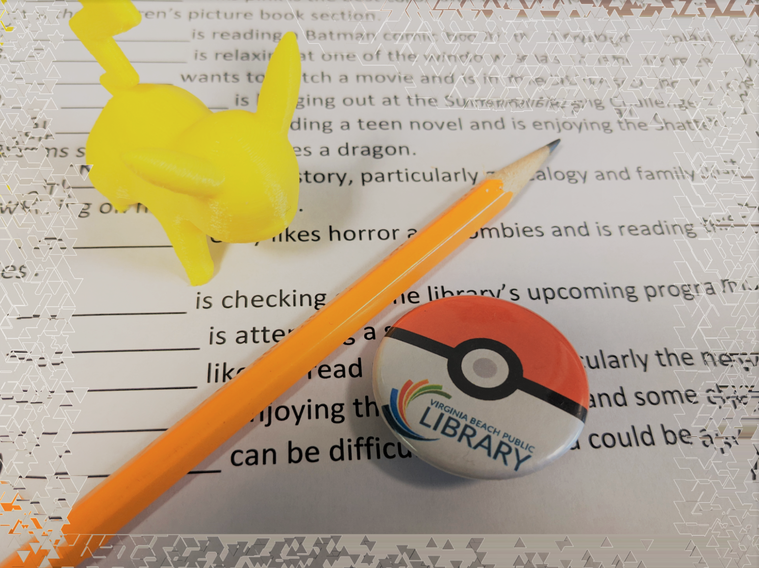 sheet of paper with 3D printed Pikachu, pencil, and Pokeball button