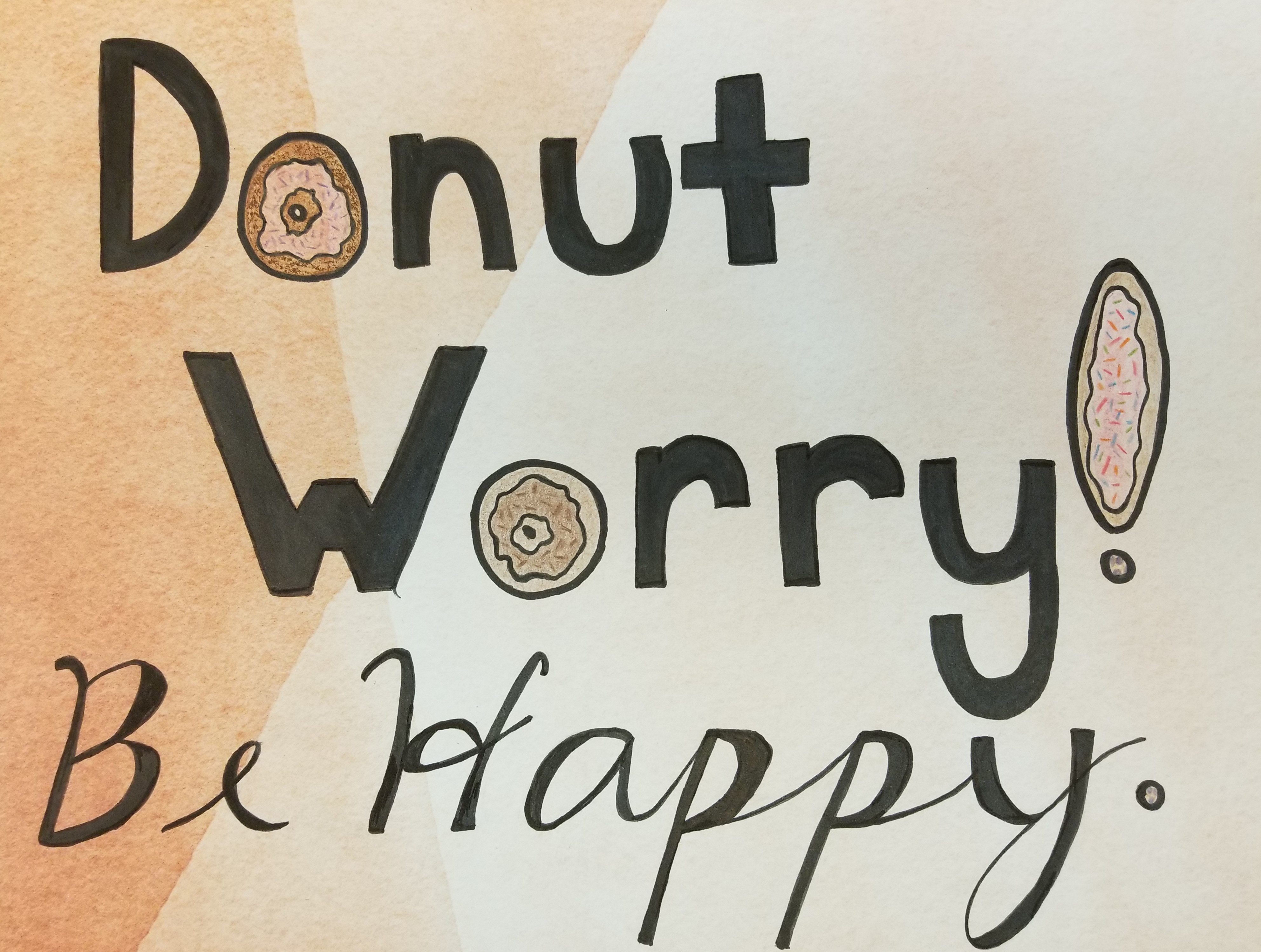 Sample of hand lettering project with words "Donut Worry! Be Happy."