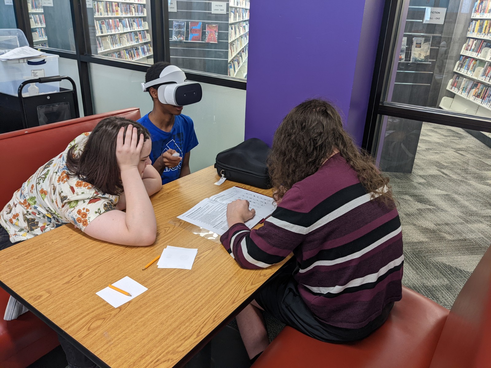 Group of teens playing a virtual reality game