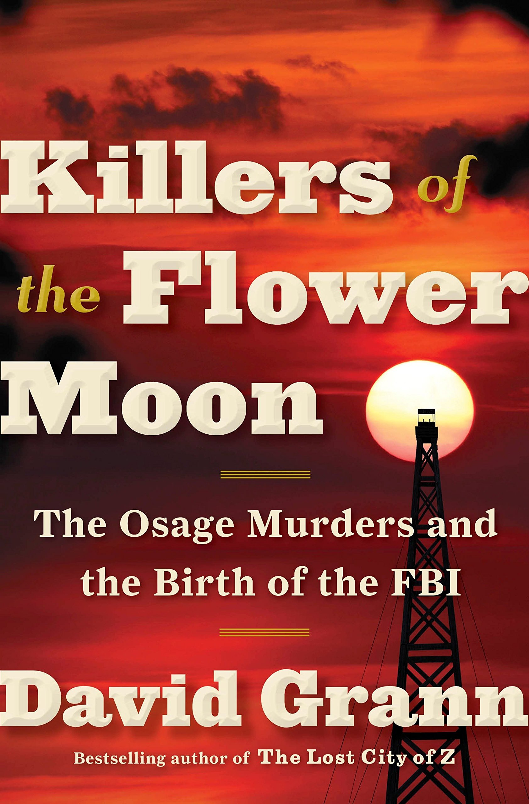 The cover of Killers of the Flower Moon. An oil rig is silhouetted against a full moon with an orange sky as a background.