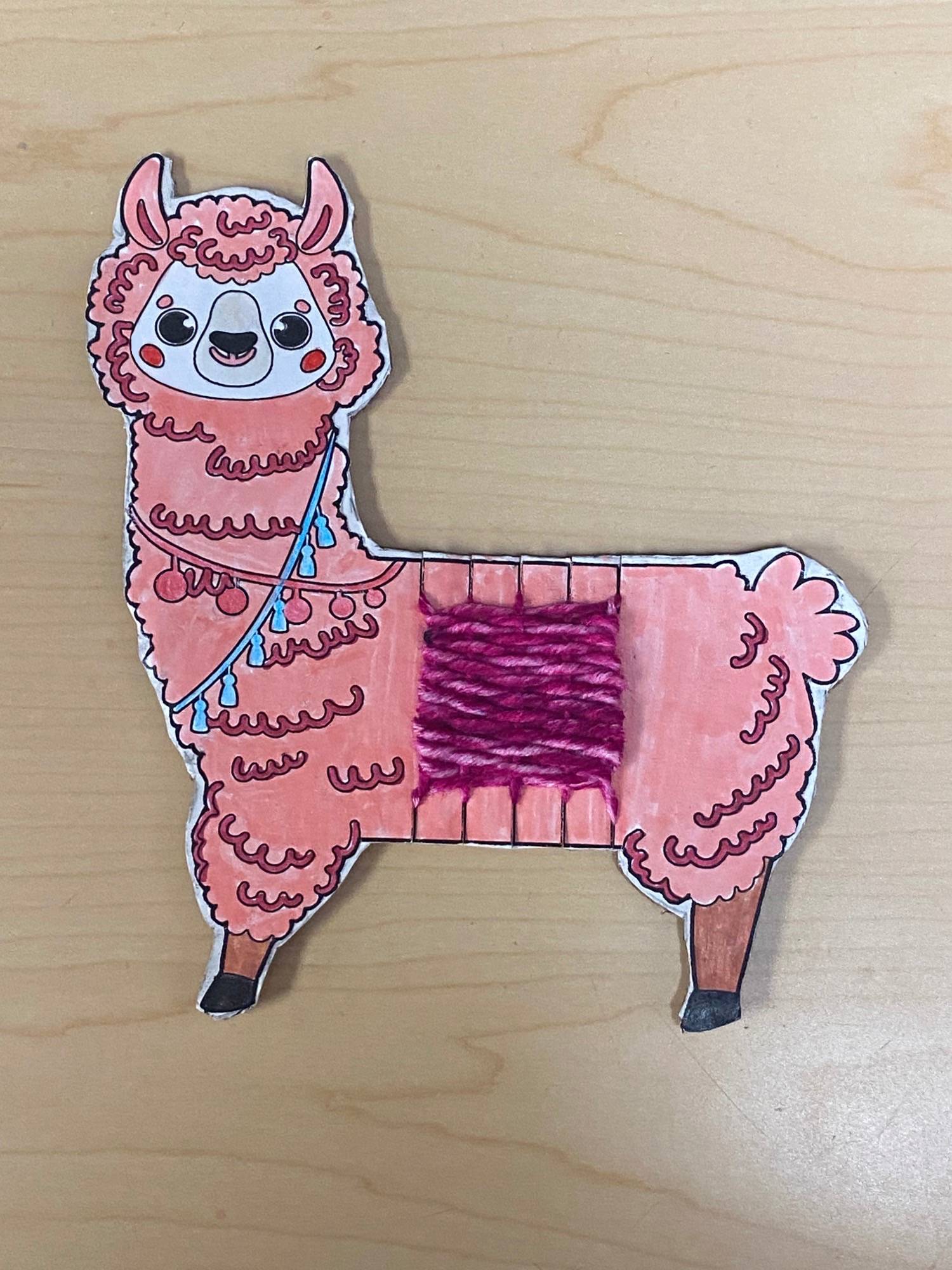 Llama craft with sweater made from yarn
