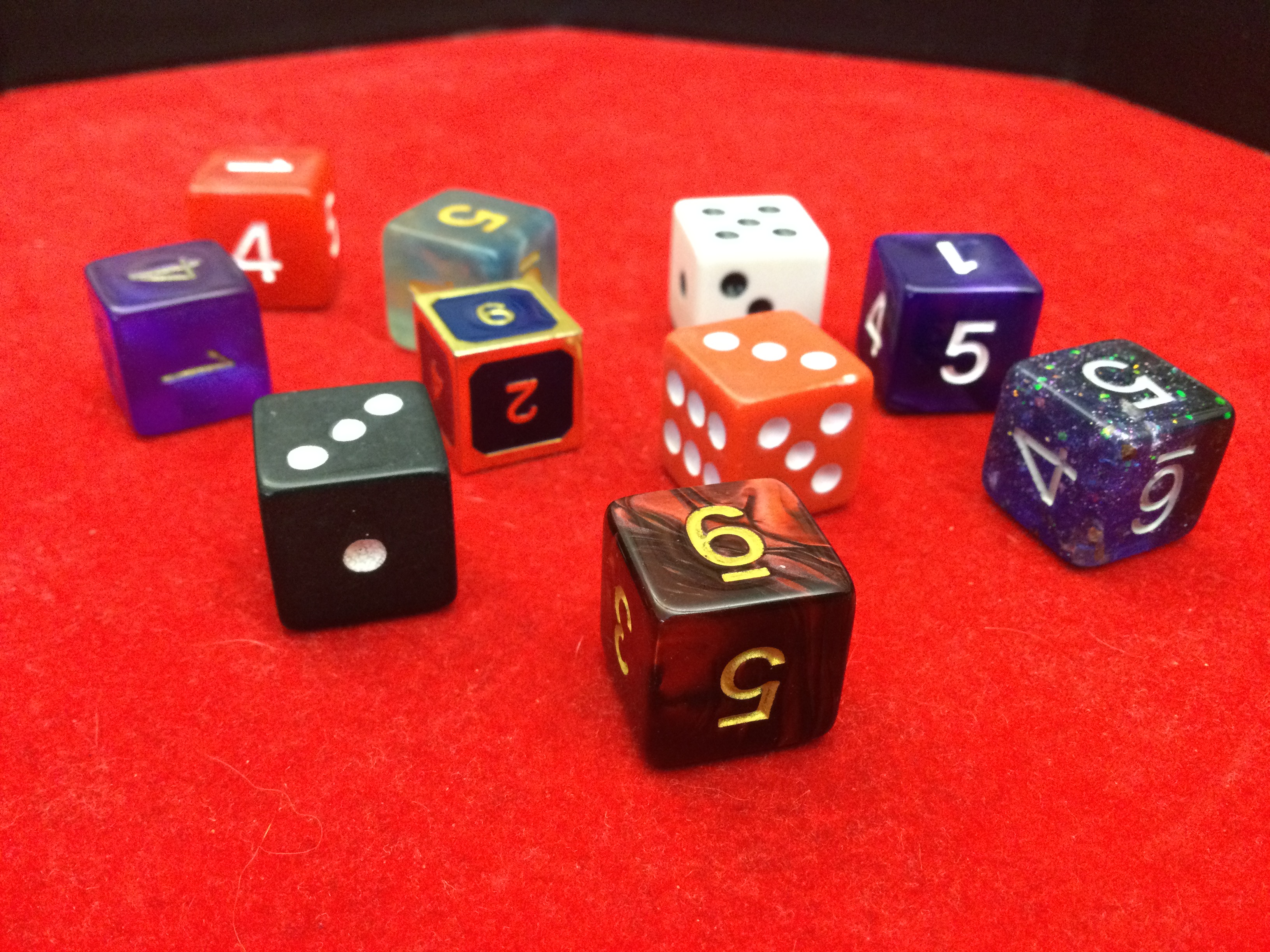 A handful of 6 sided dice