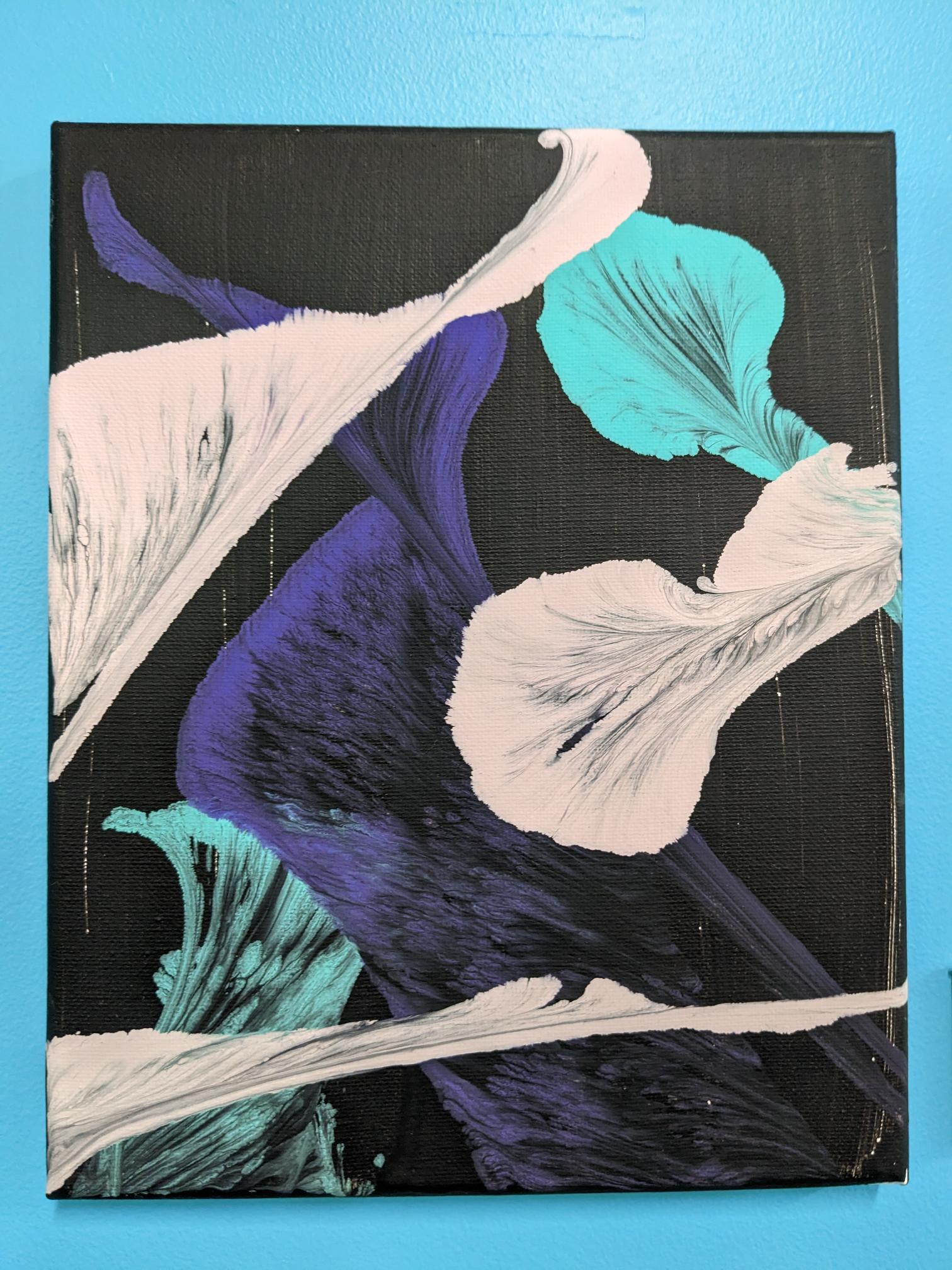black canvas with examples of string pull in purple, teal, and peach paints (paint pouring technique)