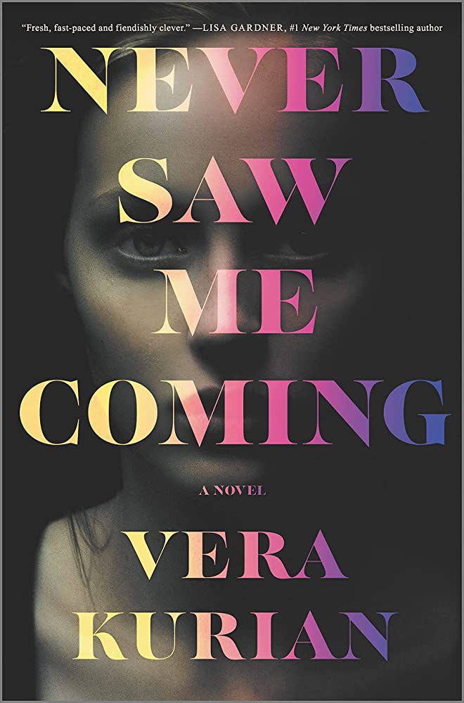 Woman in background with the title "Never Saw Me Coming" by Vera Kurian in the foreground. The text is in a yellow to pink to purple ombre across each word.