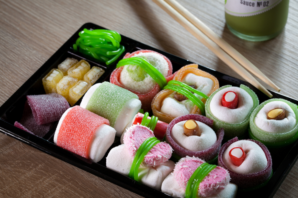 bento box with candy sushi and chopsticks