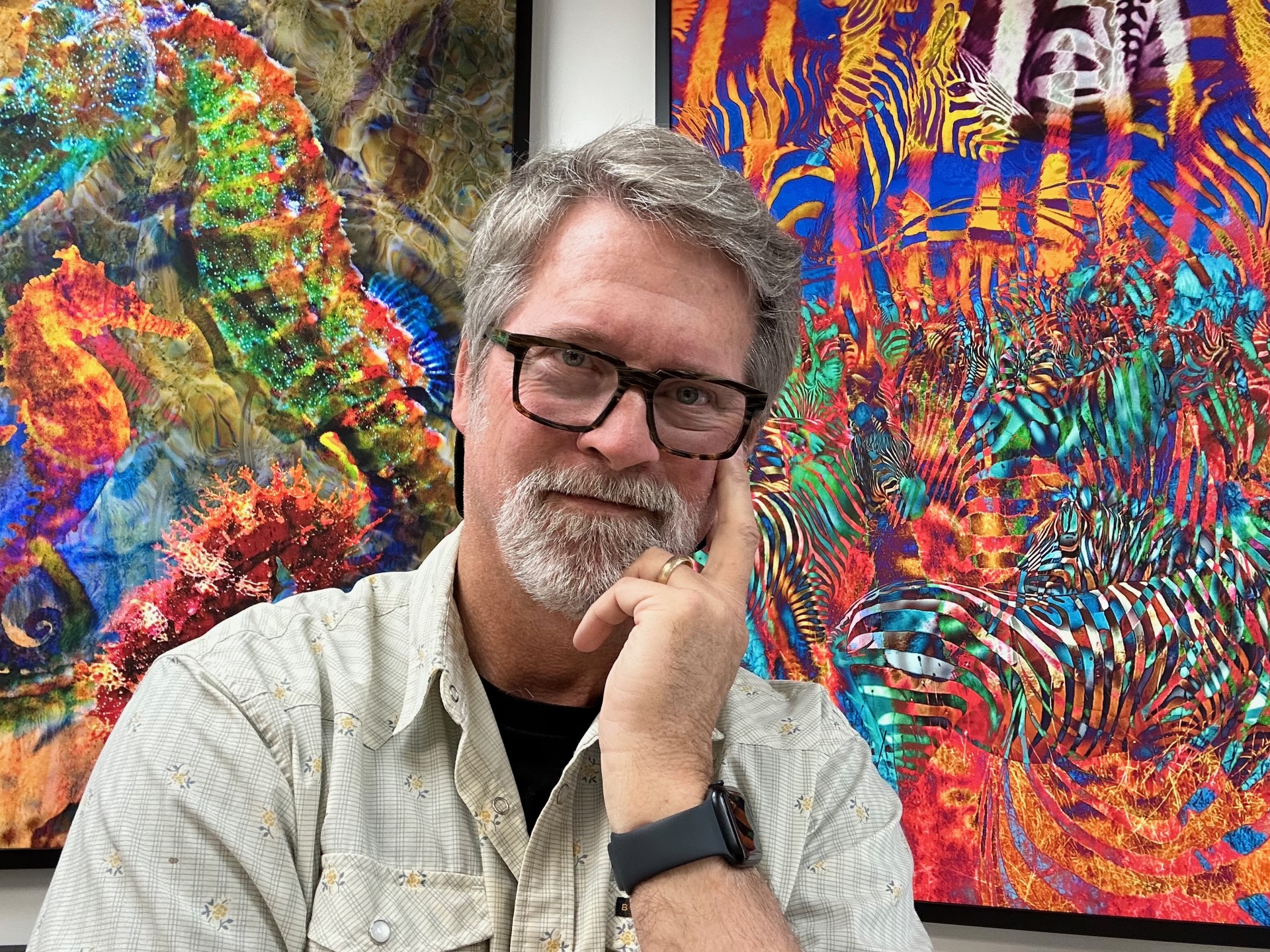 John Koehler, artist in front of his artwork. 