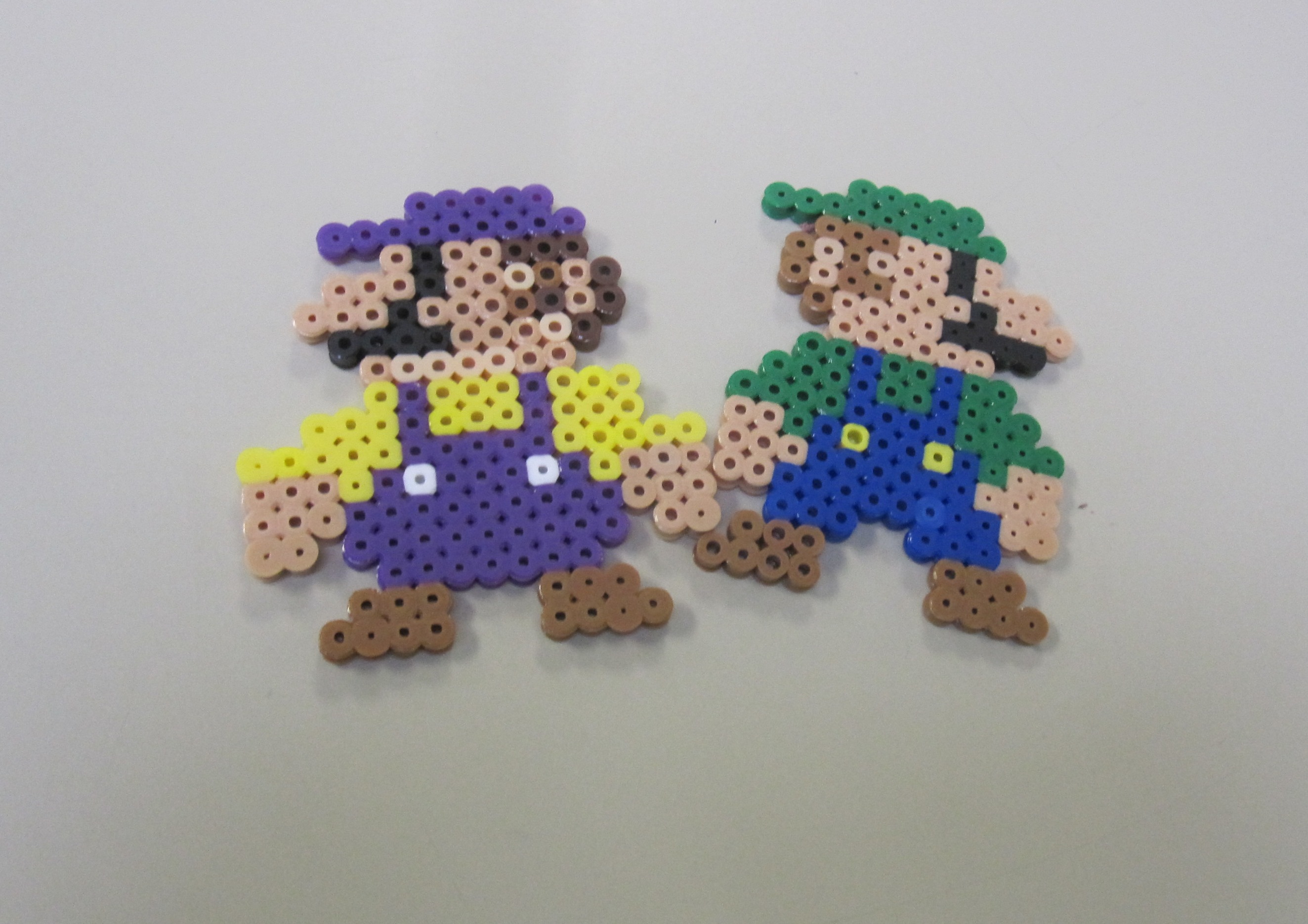 Wario & Luigi made out of perler beads.