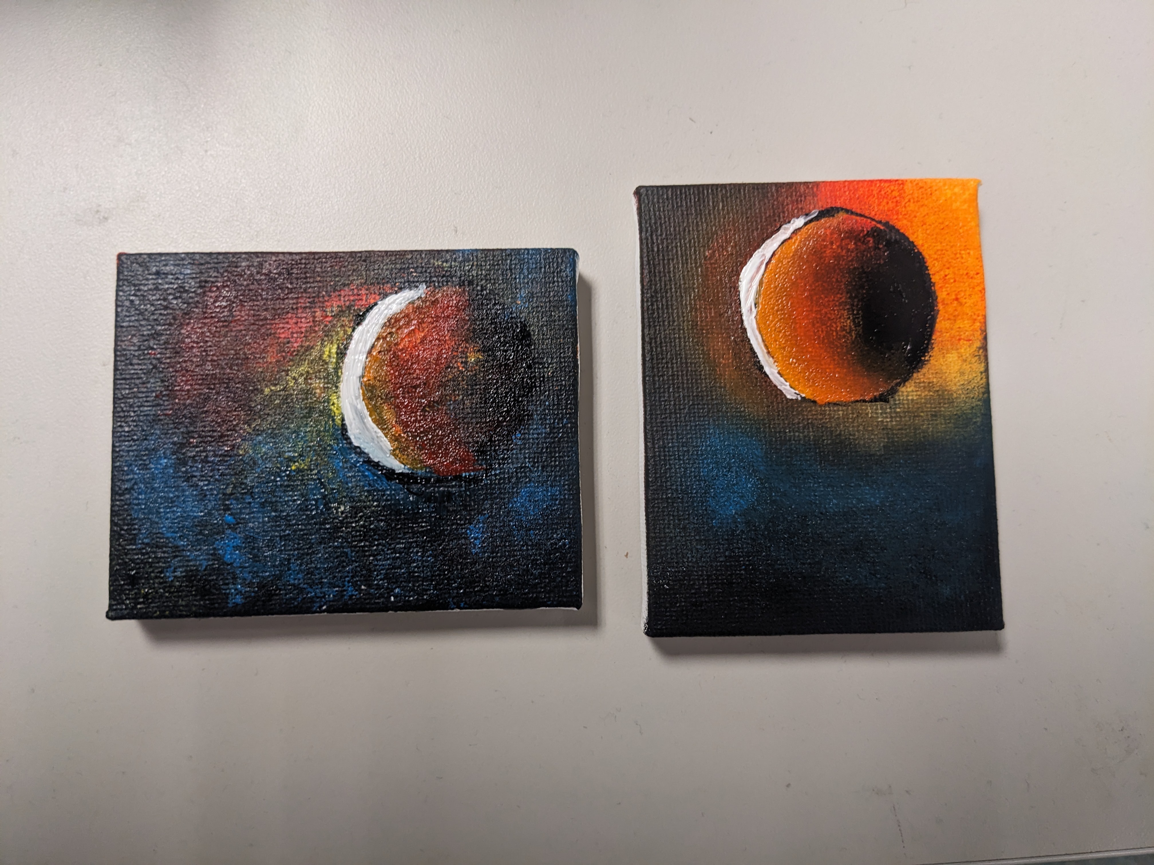two mini canvas with eclipse 