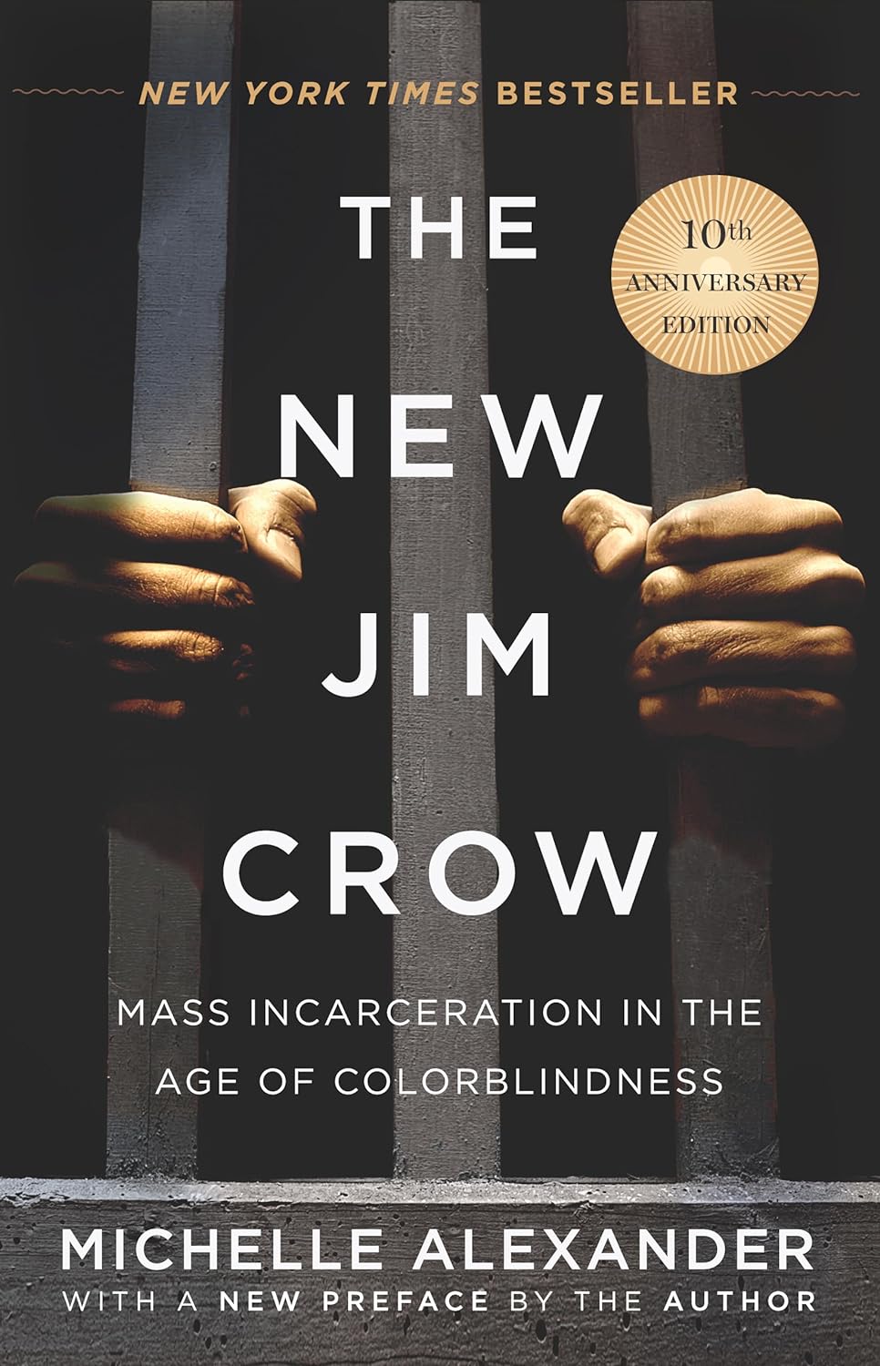 The New Jim Crow book cover, including black hands holding prison bars
