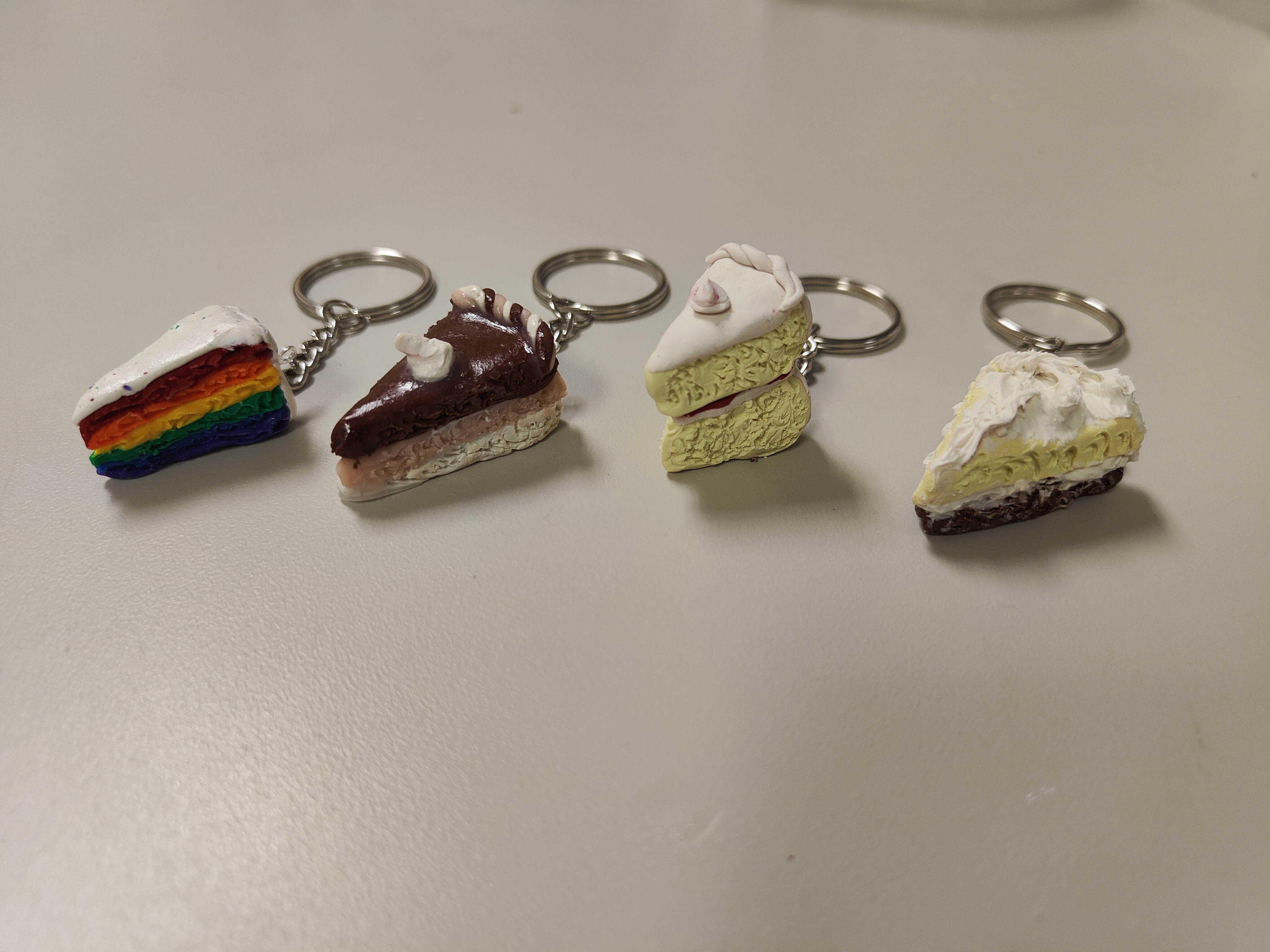 4 mini slices of cake on keychain