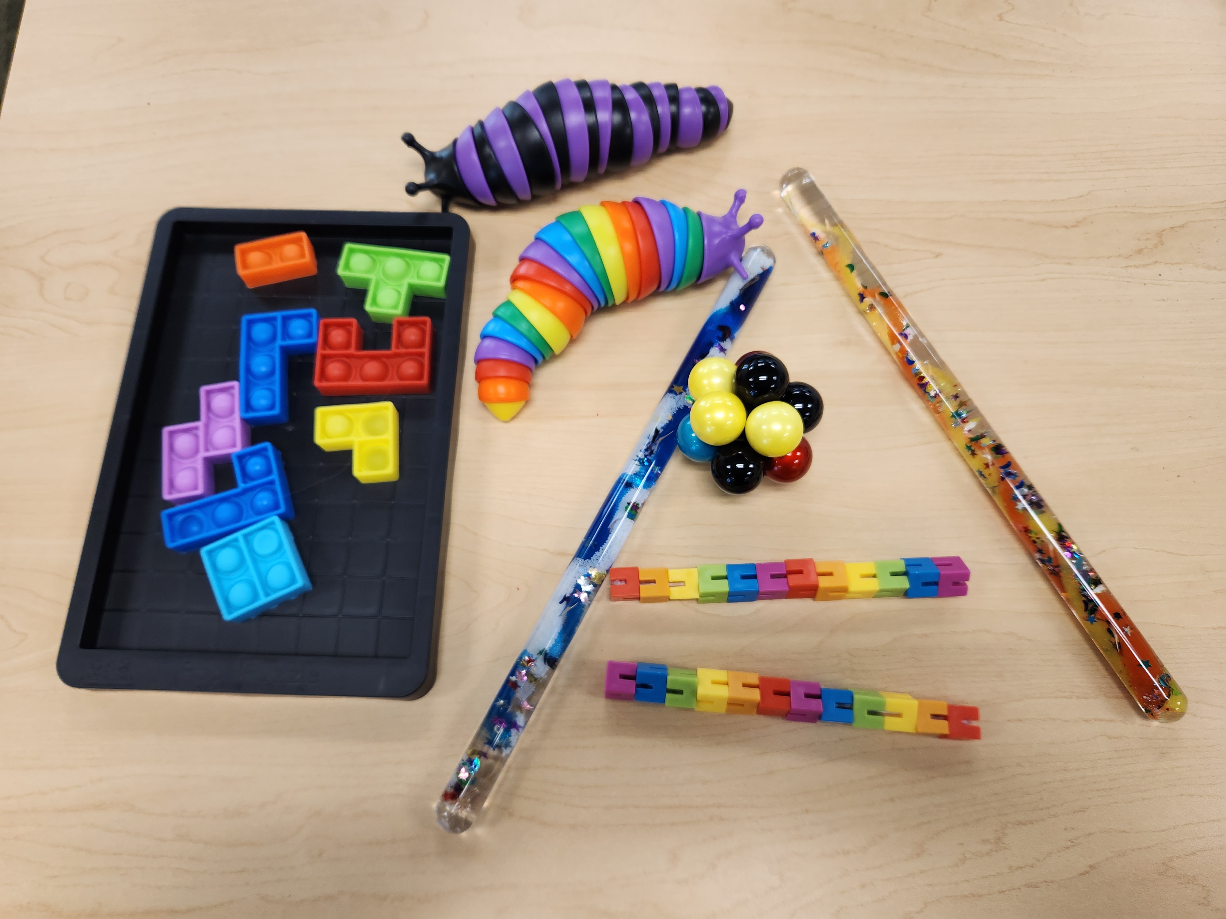 Various fidget toys available with featured activity.