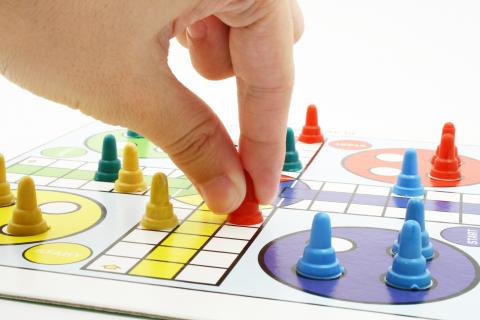 Player taking a turn in a board game