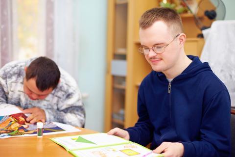 photo of young man studying