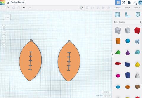 screenshot of Tinkercad program - football earrings