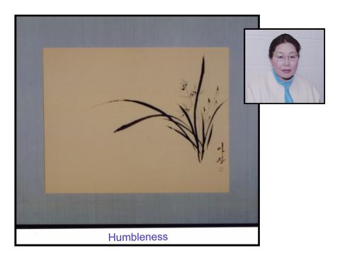 Artist Soonja Cho with one of her Oriental brush paintings