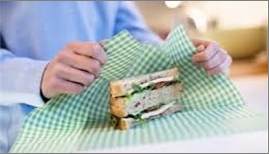 food being wrapped in beeswax cloth