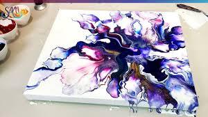 Canvases with poured painting, acrylic paints