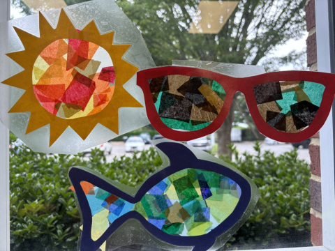 handmade suncatchers in sun, fish, and sunglasses shapes