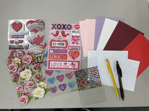 3D stickers, colored cardstock, envelopes, sequin stickers, pencil, pen