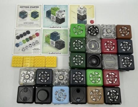 Cubelet coding toys with some instruction cards.