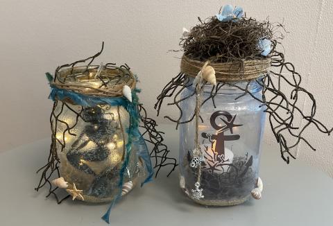 Jar with mermaid silhouette and jar with anchor silhouette