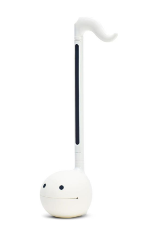 A white otamatone toy that looks like a white music note.