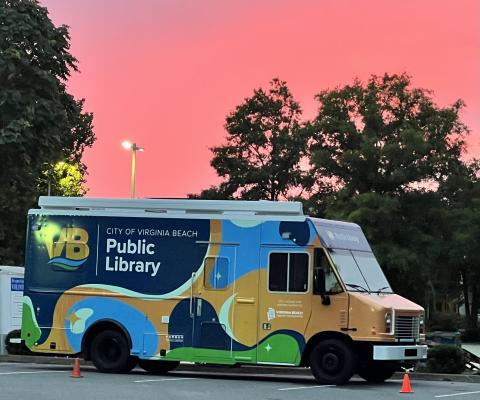 bookmobile backlit by sunset