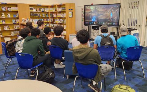 Group of teens playing video games