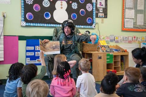 Pilot reading to children