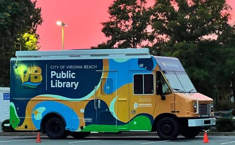 Side view of the VBPL Bookmobile at sunset.