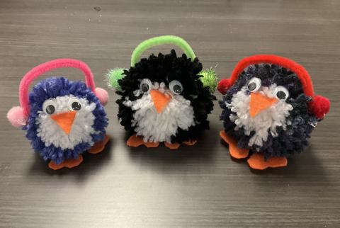 3 pom pom penguins with ear muffs