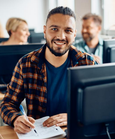 person sitting at computer