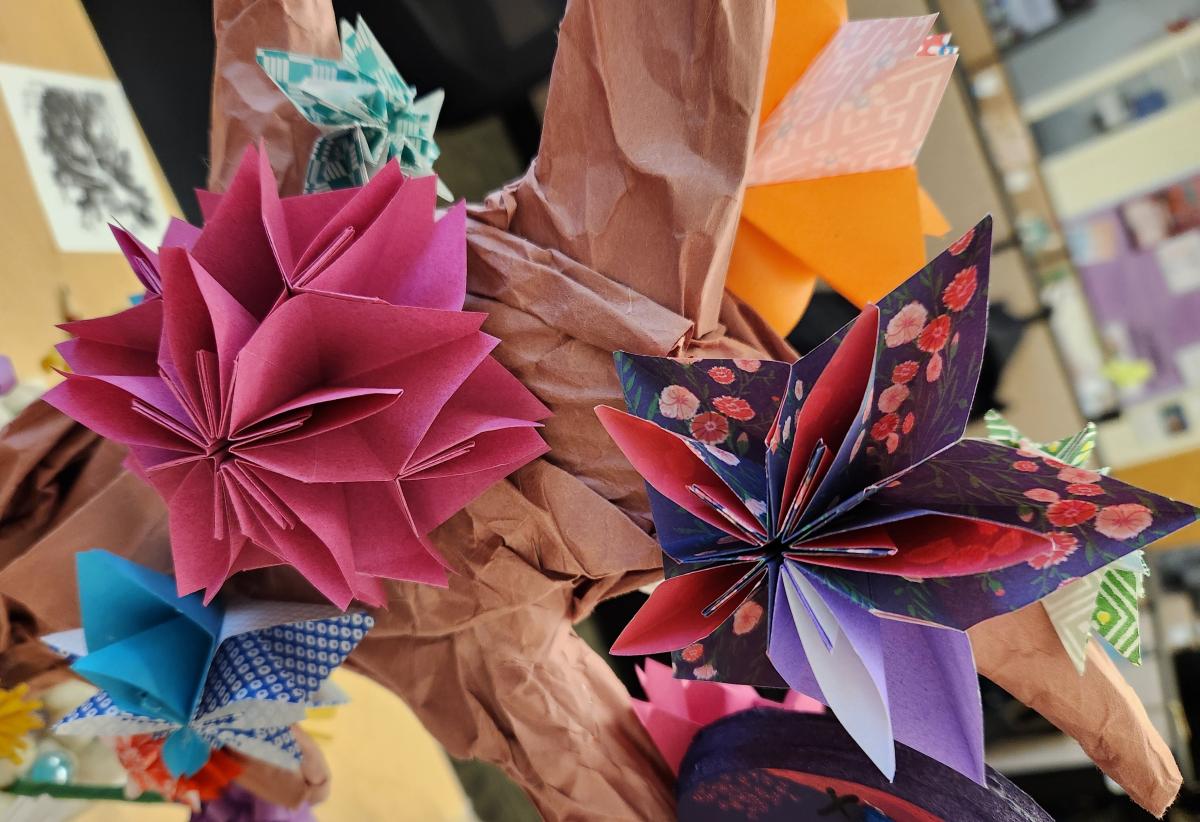 Paper flower sample in purple and magenta colors