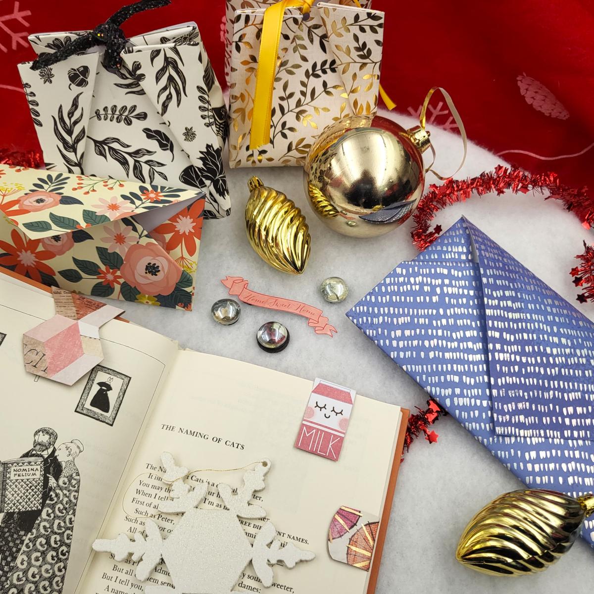 Image featuring gift bags, envelopes, bookmarks, and fridge magnets made of scrapbook paper