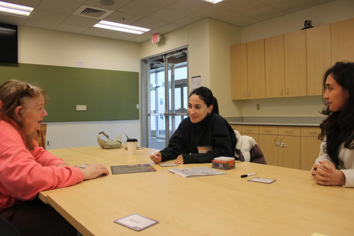 Participants playing Blank Slate game at tables