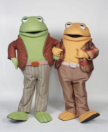 two people in frog and toad costumes