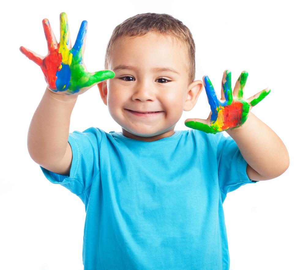 toddler with painted hands