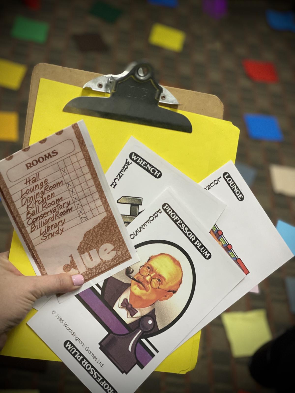 Clue game card of professor plum and clipboard