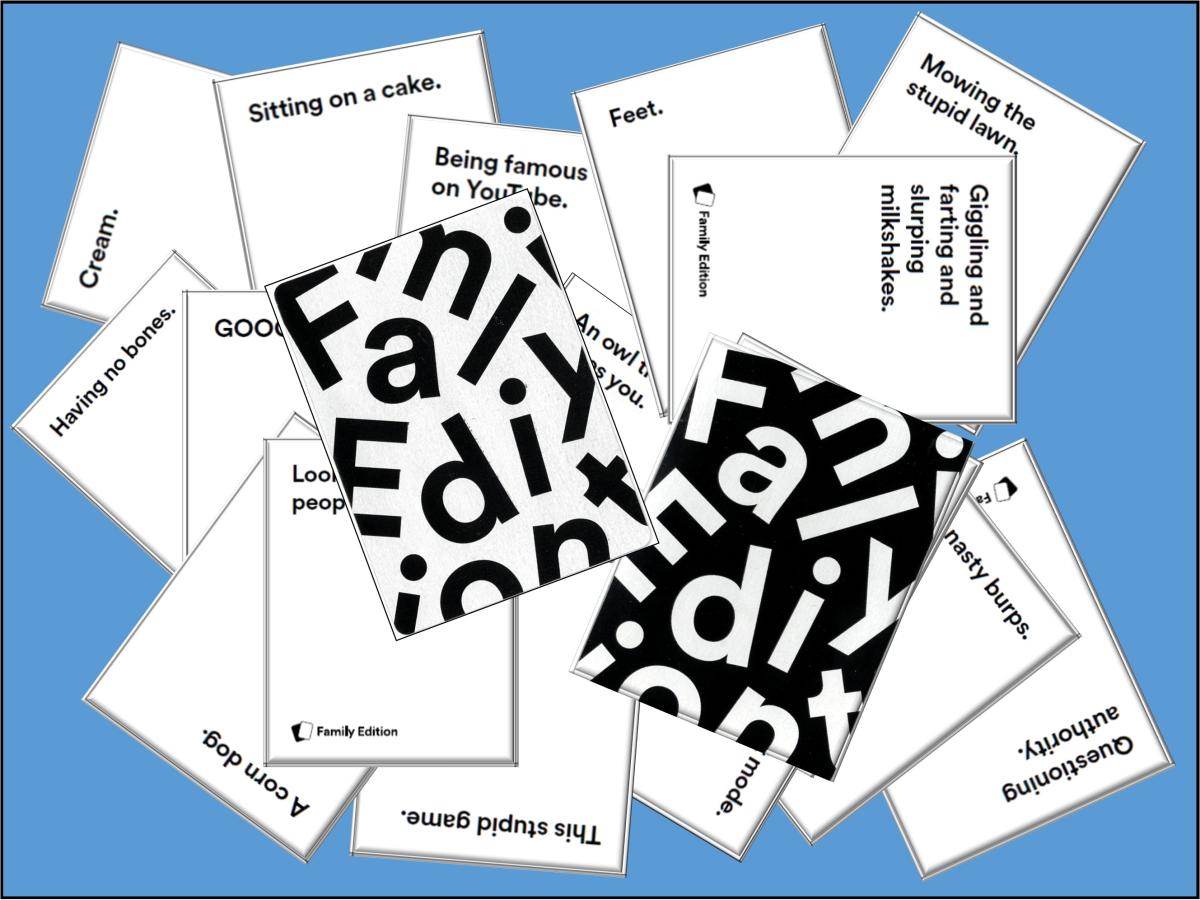 cards from Cards Against Humanity Family Edition against a blue background