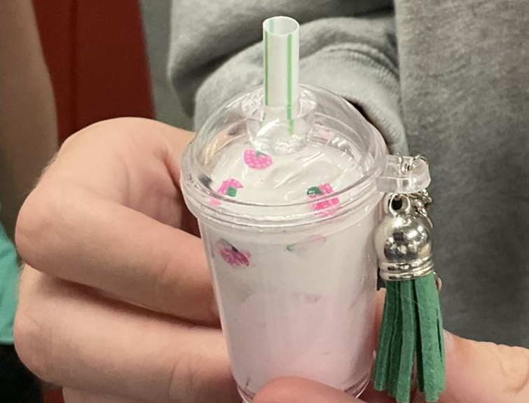 Sample of pink mini milkshake with green tassel